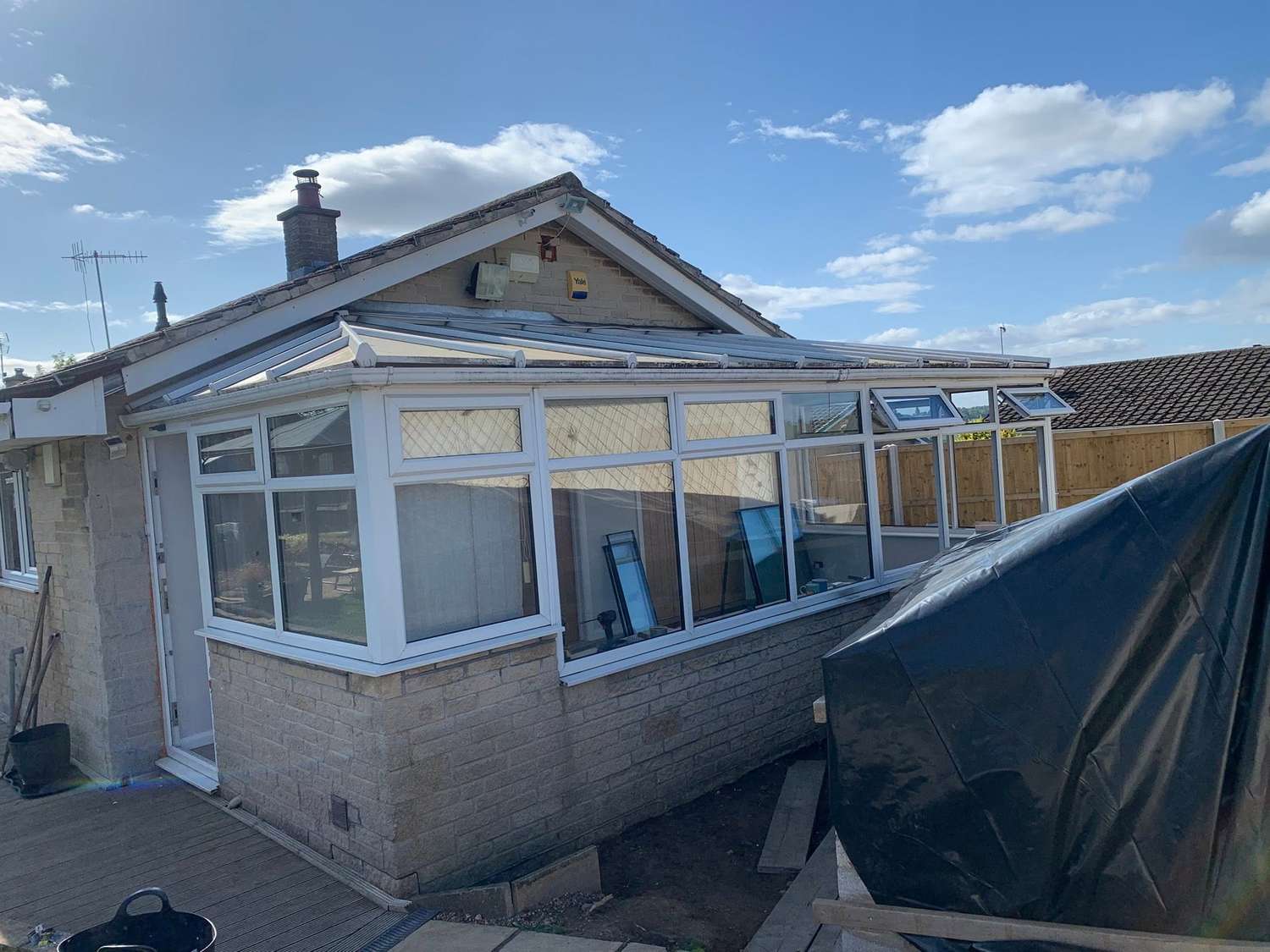 The old conservatory before the work started, with the roof being taken off